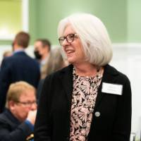 Audience members talking